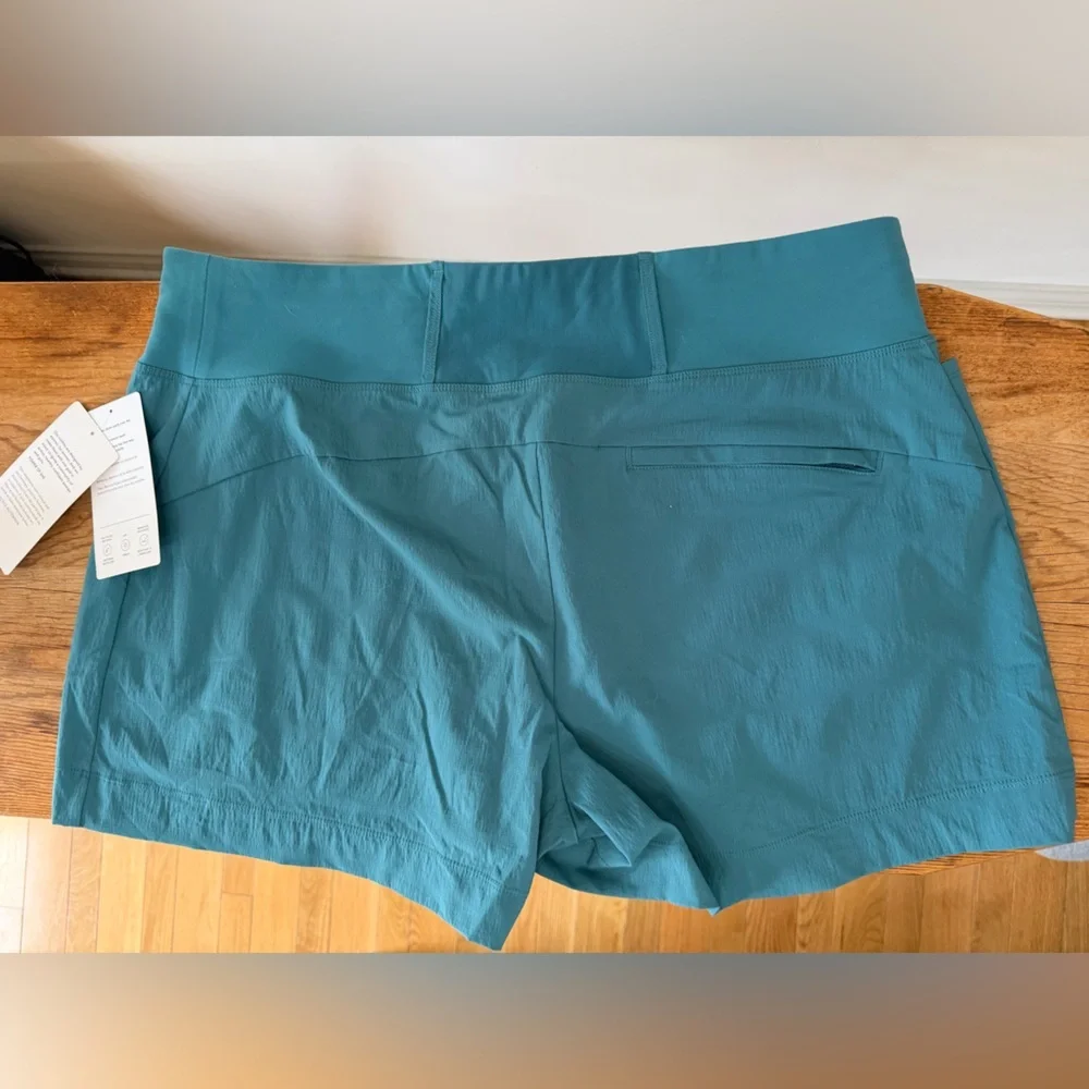 NWT Athleta Trekkie North 3.5” Shorts Teal Zip Pockets Elastic Waist Women’s 16